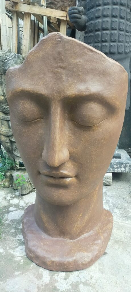 Woman Face Statue